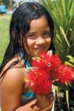Northland girl with Pohutakawa flowers Northland girl with Pohutakawa flowers